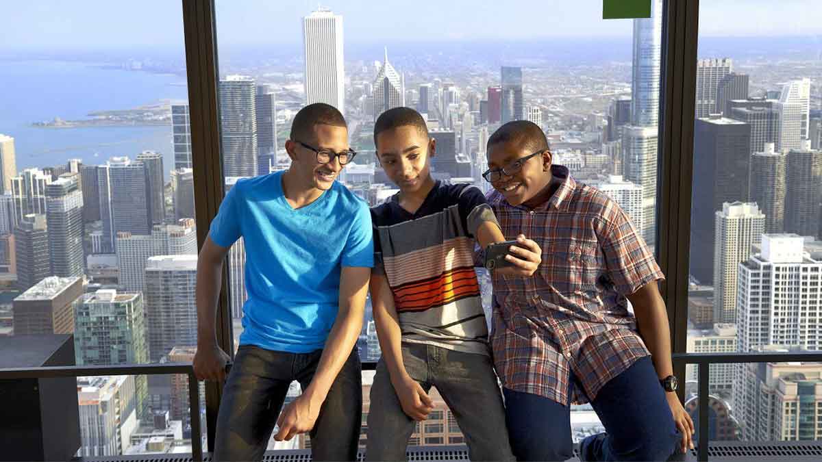 kids taking selfie at 360 chicago